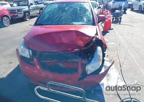 2013 Suzuki Sx4 Le/Le Popular z USA, uszkodzony, nr VIN JS2YC5A36D6100855